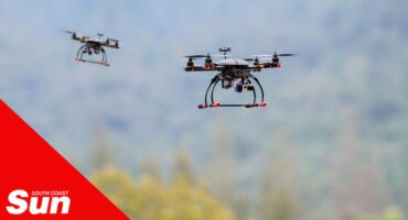 two drones flying in the sky