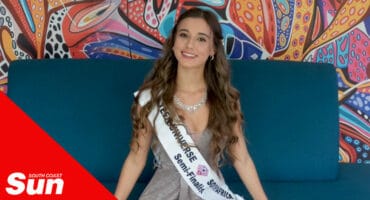 a teenage pageant princess shows her sash in a model shoot