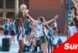 netball girls playing on court