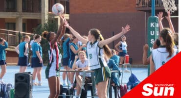netball girls playing on court