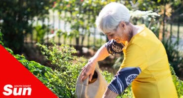 a women watering her plants