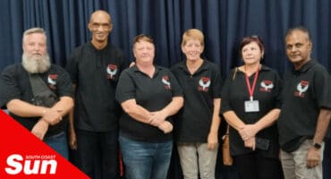 a group photograph of neighbourhood watch committee members