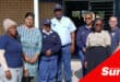 a group photograph with police officers and speakers at a child care centre