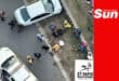 An overhead photograph of the suspect being apprehended by police and security companies