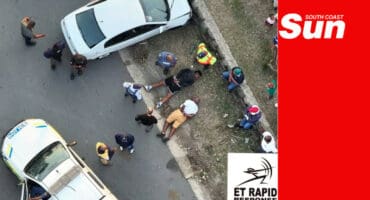 An overhead photograph of the suspect being apprehended by police and security companies