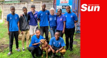a group of volunteers at an animal pet owner non profit organisation