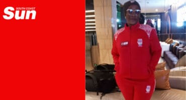a portrait of a woman wearing a tracksuit