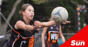 a netball player passes the ball