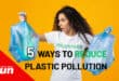 a woman holding two plastic bags