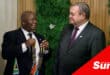 an organisation's former president handing over the chain of command to another member
