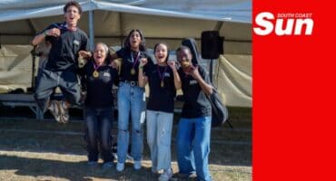 a band made up of high school learners jumps for joy