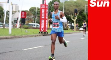 a runner on the road during a marathon