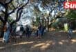 a group of people in nature conducting an anti-poaching day