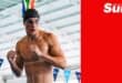 a swimmer that just exited the pool