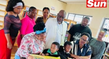 Learners go over the new literary material with their teachers.