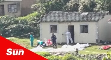 bodies covered up, police and forensic pathology service outside a home process a crime scene