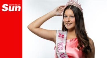 a pageant princess teenager's studio portrait with her tiara and sash