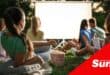 an outdoor movie night with popcorn and blankets