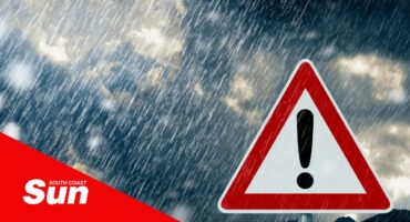 a stock image featuring stormy weather and an alert sign