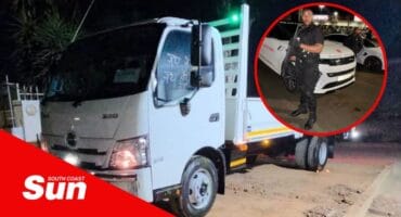 a truck. inset is a security officer with an assault rifle