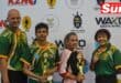 a family photograph of kickboxers