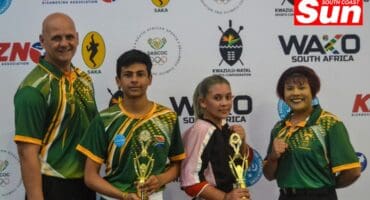 a family photograph of kickboxers