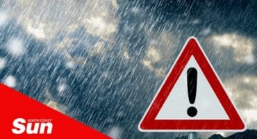 a stock image of a storm with a storm sign