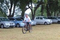 W/O Raymond Smolas leads the runners and walkers around the track.