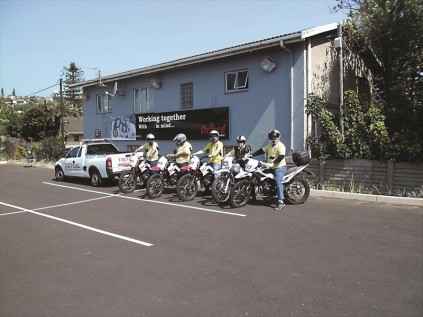 Some of the volunteers on the COP bike squad get ready for patrol.