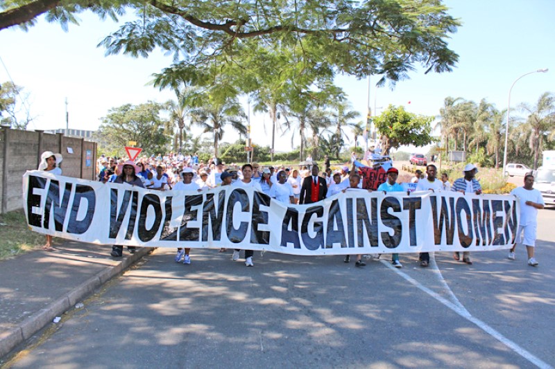 Protesters stand in solidarity against child abuse.