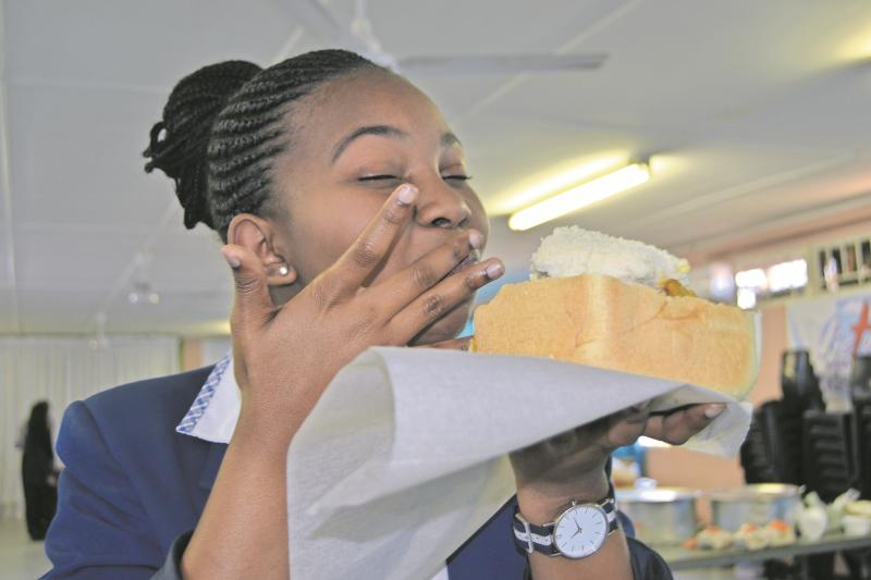 Matric pupil, Phindile Myeza savour the flavours in her chicken bunny