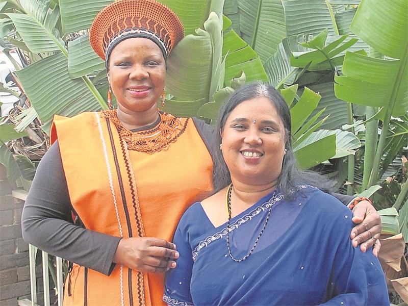 SAC Beauty Zibane and SAC Patsy Subramanian, dressed up in their traditional gear in honour of Heritage Month.