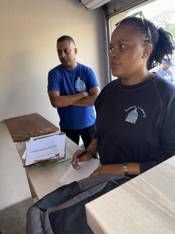 The environmental health's Jerome Kaloo and business licensing's Nobukhosi Mkhombe required to check the papers of all premises.