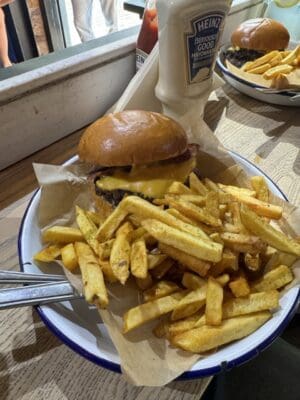 A delectable burger and chips, I bought from one of the street food places.