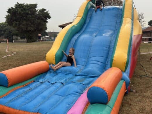 Learner having fun at school’s spring day fun day.