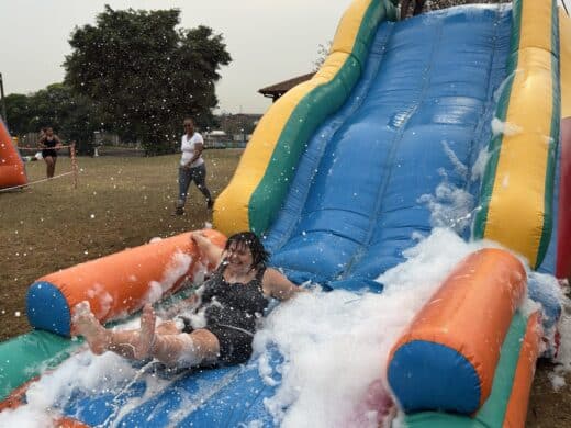 Teacher having fun at school’s spring day fun day.