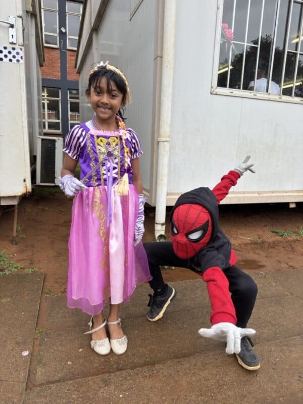 Saaranya Pillay and David Schinittker dressed as the pretty princess Rapunzel and the heroic Spiderman.