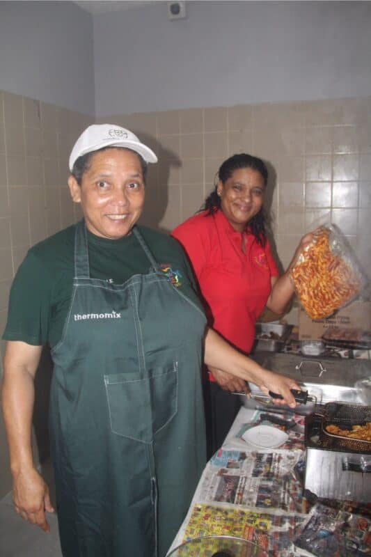Rochelle Dunn and Carmel Draai frying up a storm.