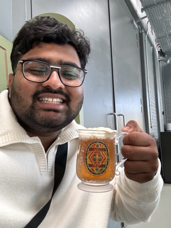 Dillon Pillay enjoys his cup of Butterbeer.