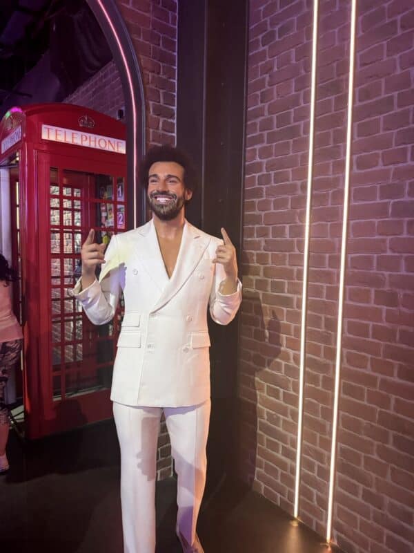 Liverpool sensation Mohamed Salah pictured in his dapper suit.