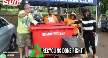 Mark Kirsten drops off his e-waste with the help of Thabisile Nsindane, Emeldah Mkhulisi and Lungile Dlamini.