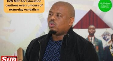 KZN MEC for the Department of Education, Sipho Hlomuka stands outside a school classroom