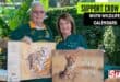Compass Medical Waste CEO Ian Du Randt and Stella de Chalain show off the new wildlife calendar.