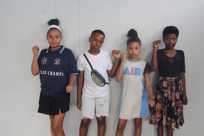 The youth from the Abbaquar San Dream Centre show their support.