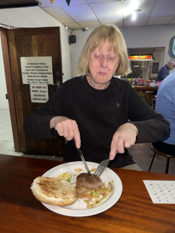 Brenda Sutton makes use of the burger and bingo special. 