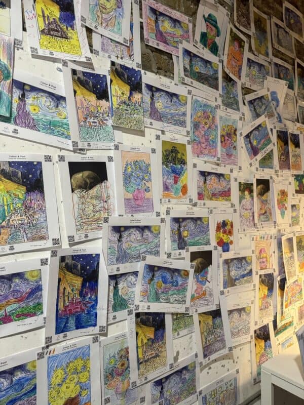 The display of hundreds of artworks made by visitors.