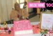 Wentworth’s Dulcie Marnce in her wheelchair behind her birthday cake and frame that is celebrating her 100th birthday.