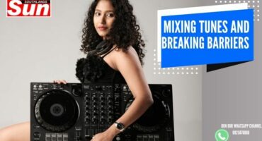 Young Indian female carrying a boombox