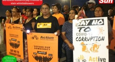 Ward committee member for safety, health and security in Merebank, Sharin Rajman took part in a a placard demonstration