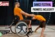 A wheelchair bound person dancing on stage